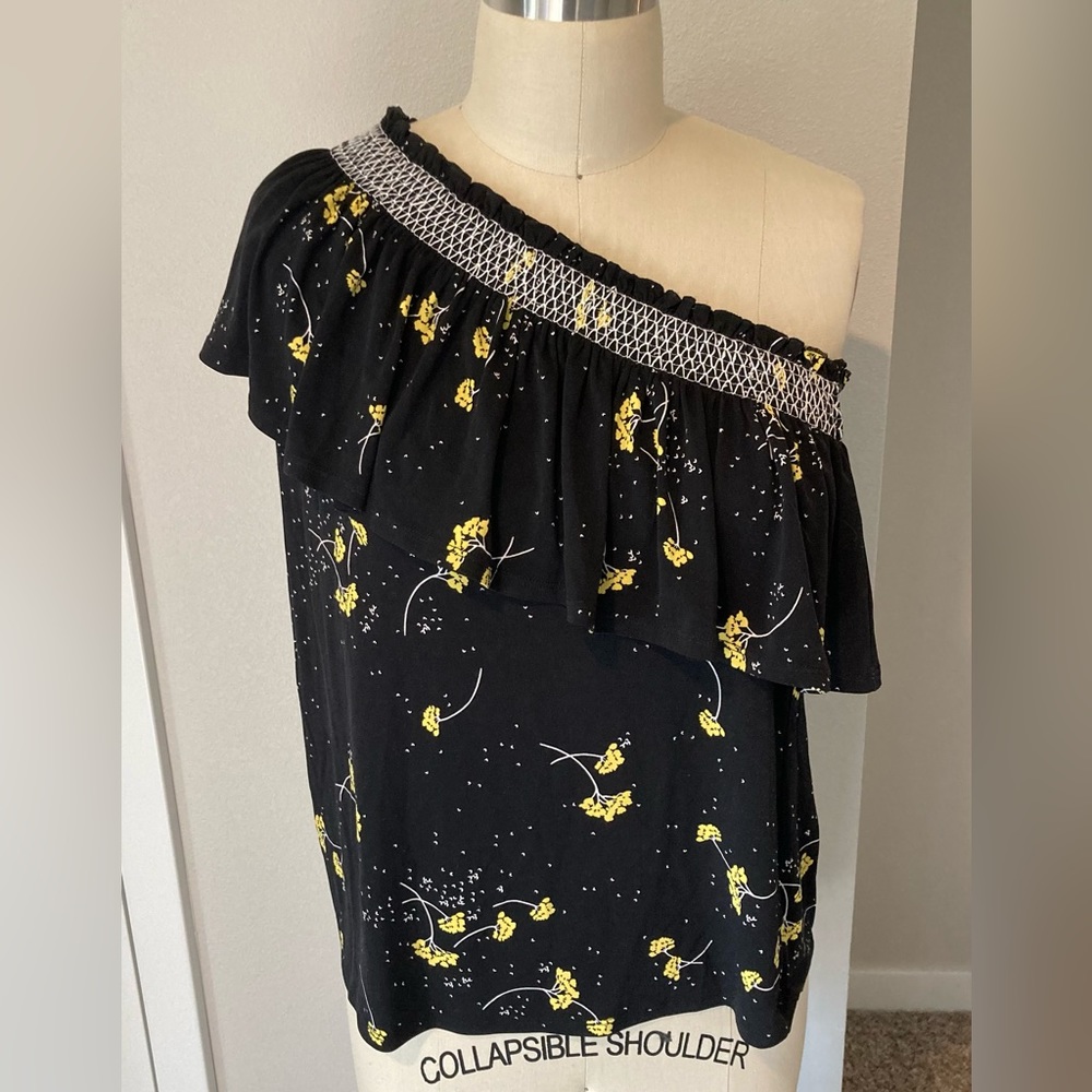 One shoulder smocked CeCe blouse with floral print.
